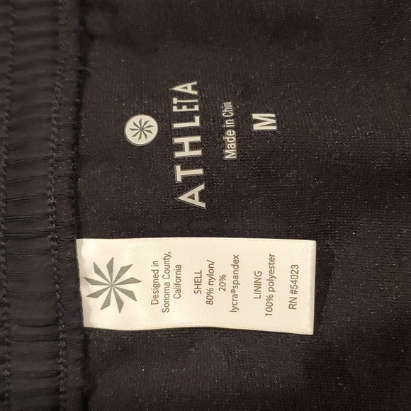 Athleta black floral running shorts M (40) - Picture 2 of 4